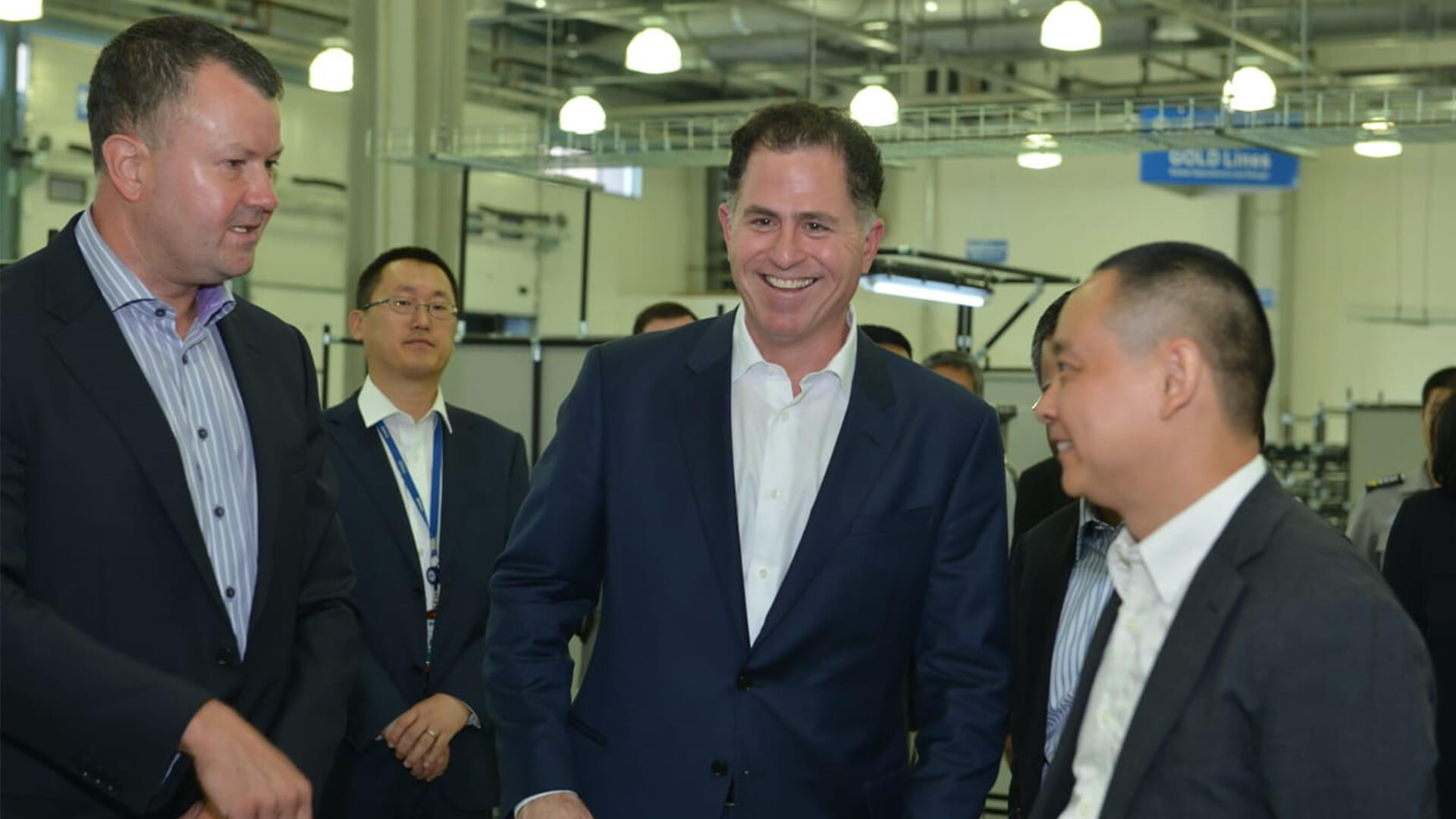 Tim Crowe with Dell Founder Michael Dell and Charles Chung